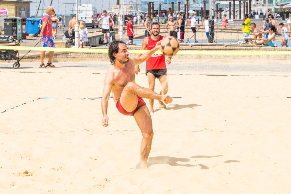 Some sun lovers on Brighton beach didn't seem to mind the heat