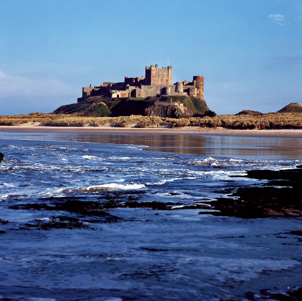 Bamburgh Castle is set high in a truly stunning spot overlooking one of Britain's best beaches