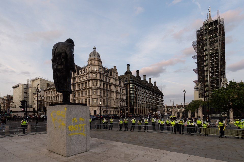 Winston Churchill's statue in Parliament Square was defaced with the words 'is a racist' during Extinction Rebellion protests 