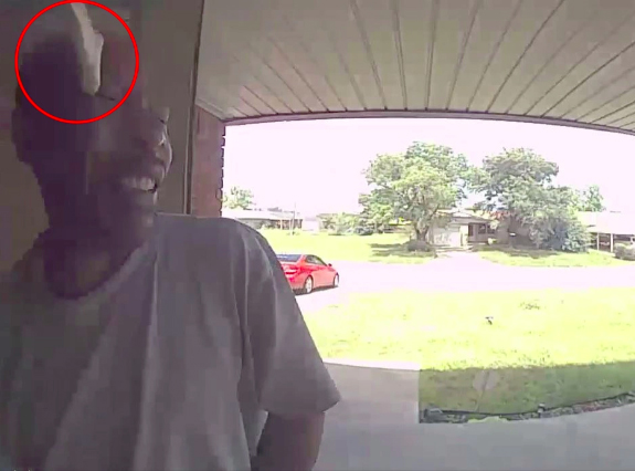 Jerel Heywood was bitten on the face hiding on a porch light in Oklahoma