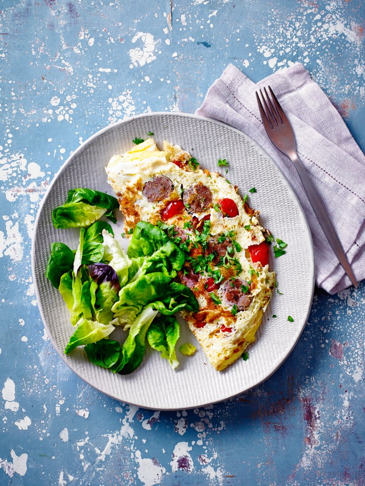 Enjoy a healthy Saturday breakfast with a sausage and tomato omelette