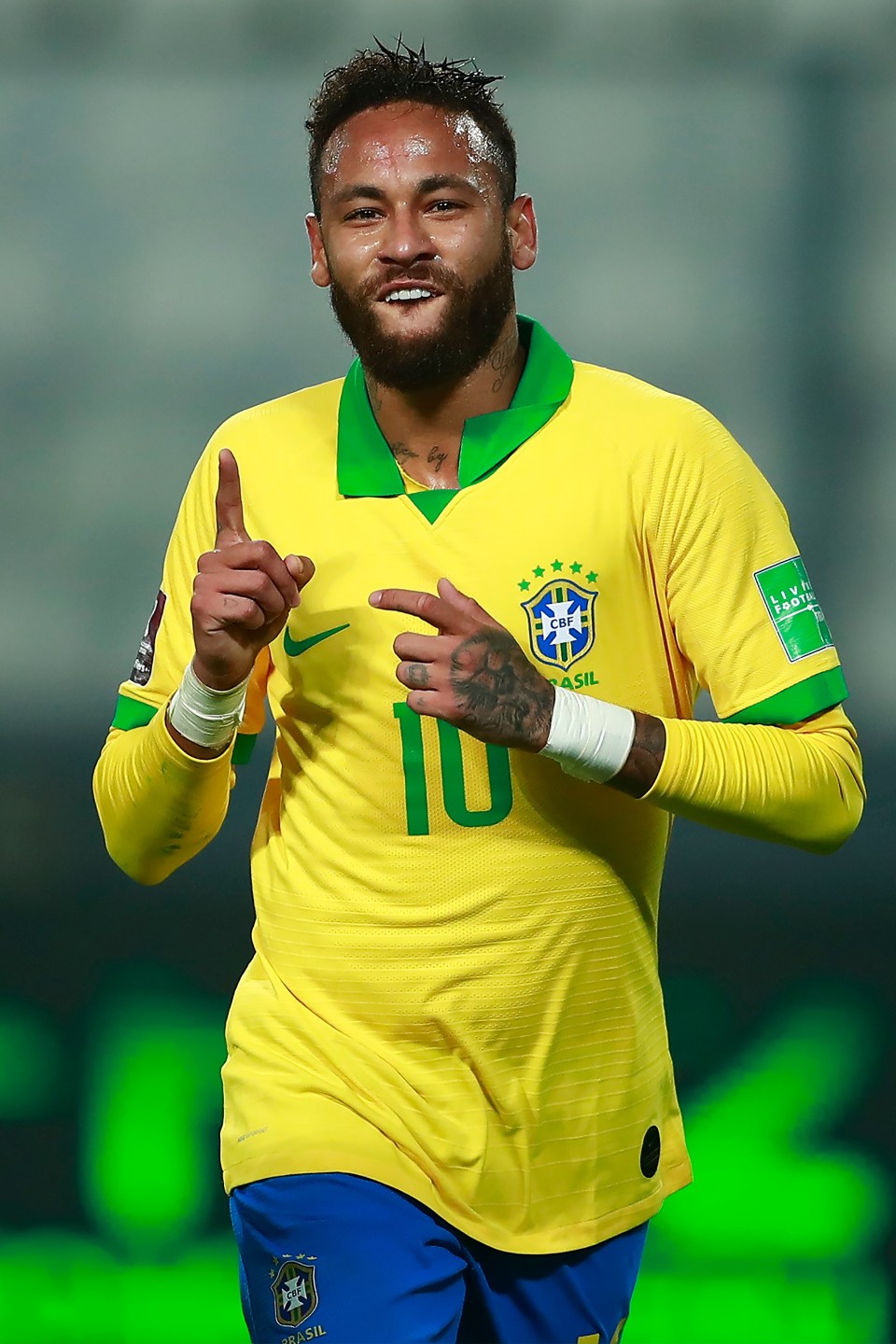Neymar bops away in celebration after netting his first goal from the spot