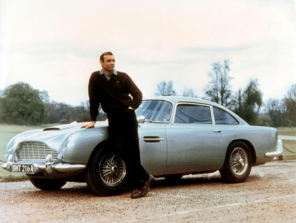 Goldfinger: Suave Sean with Bond’s Aston Martin