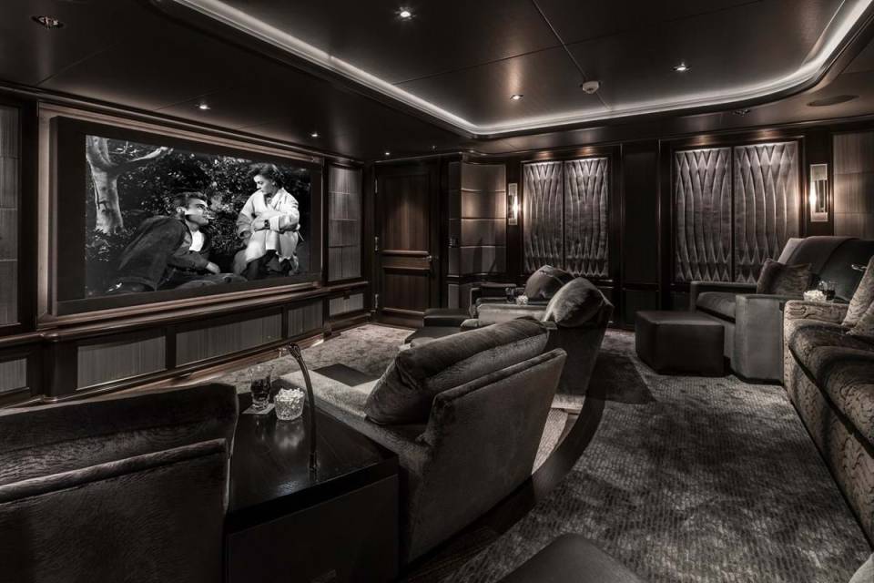 The incredible cinema room features an 85-inch screen