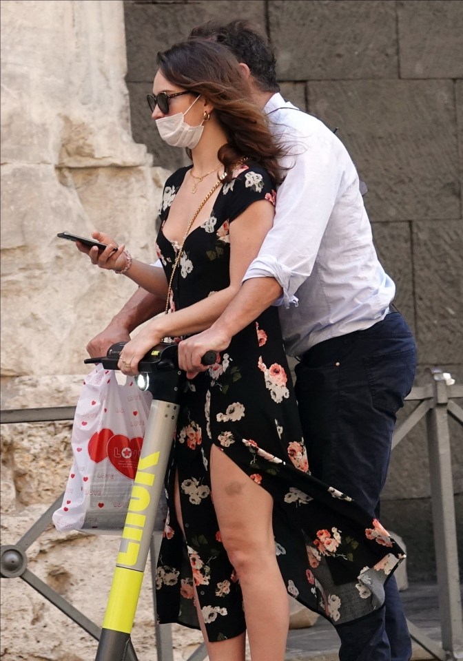 Lily wore a floral dress while Dom donned jeans and a white shirt for the scooter ride