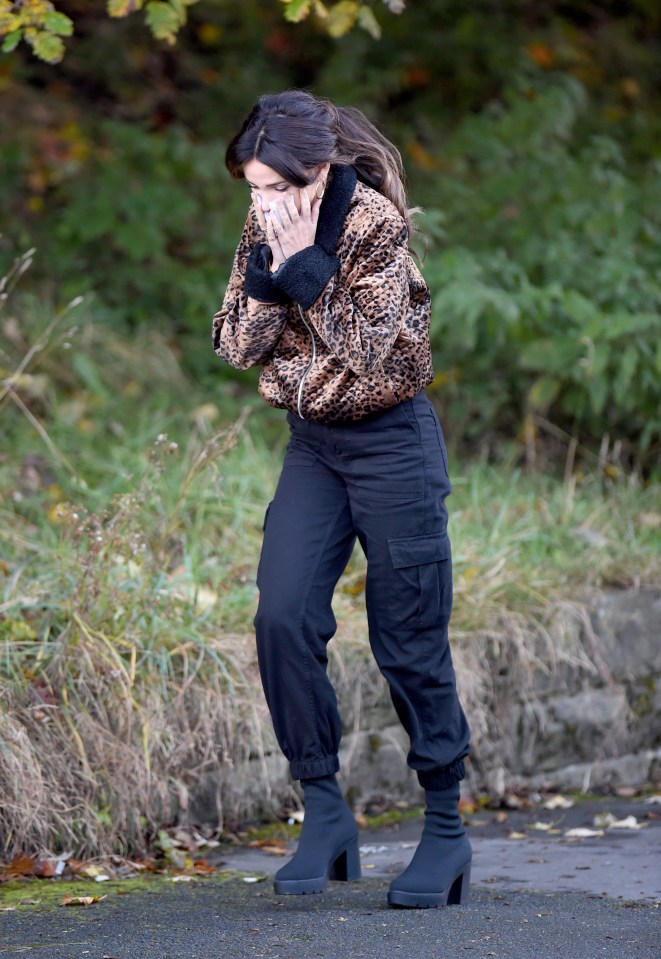 The actress kept the hand warmers close between takes 