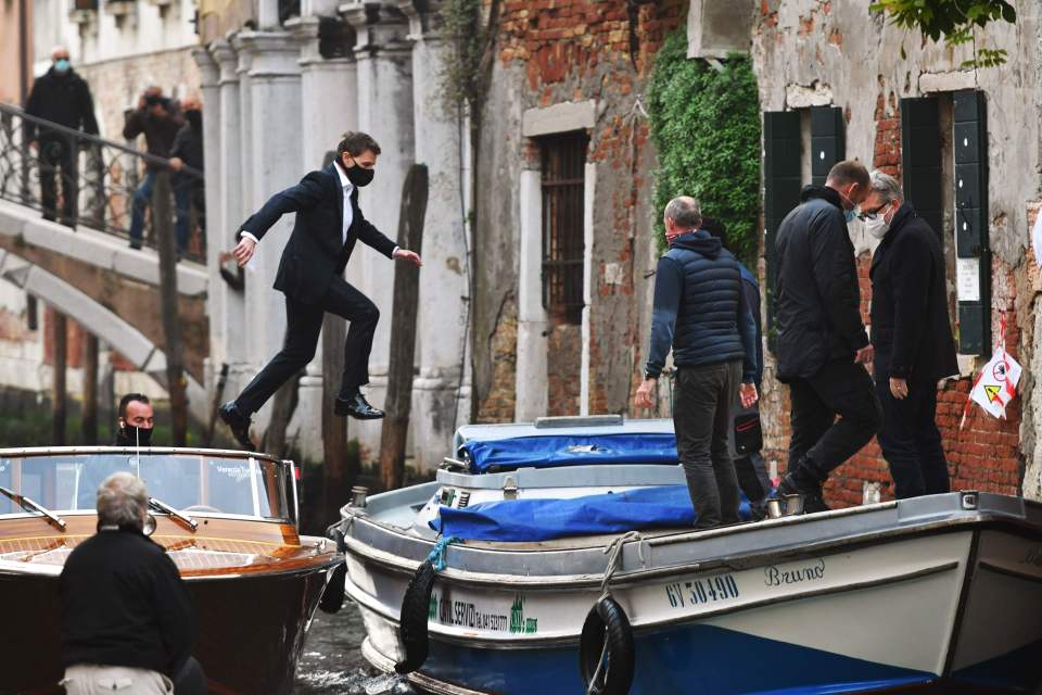 The star was pictured taking another big jump onto a second boat