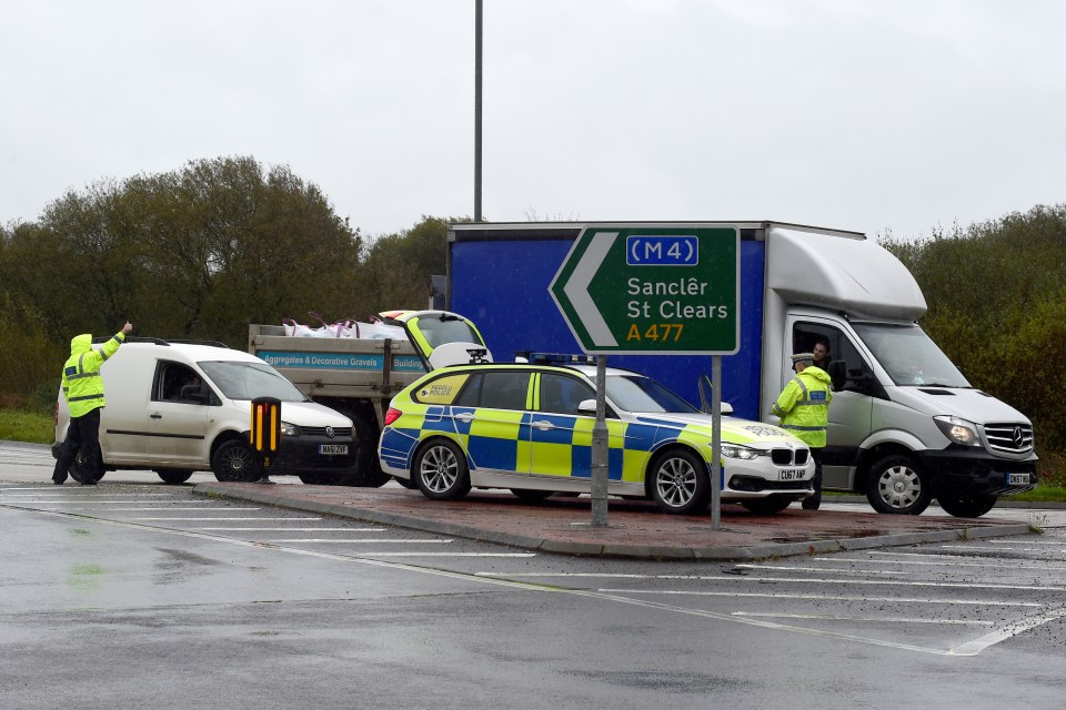 A police checkpoint is seen on the first full day of the Welsh 'fire-break' lockdown