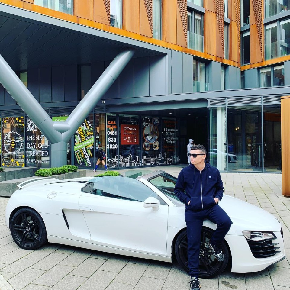 The star still lives in Manchester and has a flashy white Audi R8