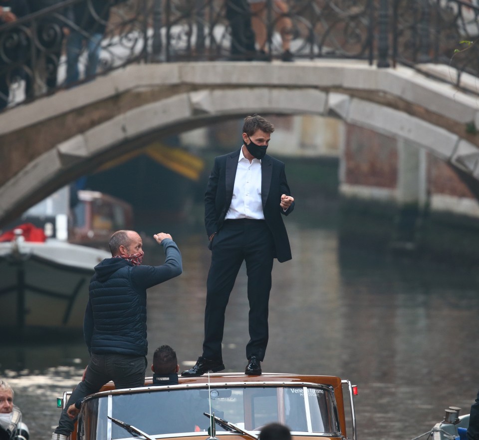 He was seen relaxing on the top of a boat in front of a bridge earlier this month