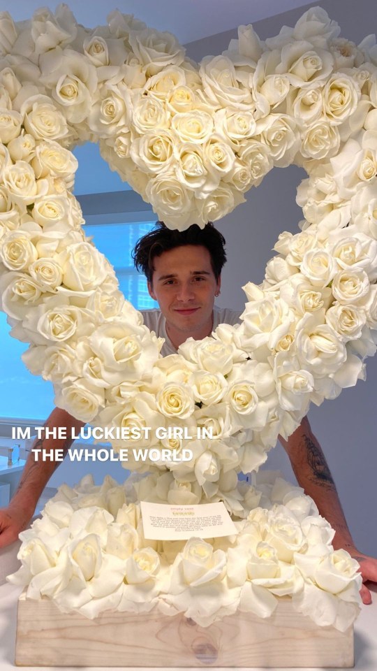 Nicola was thrilled when her fiancé gifted her a huge white rose arch