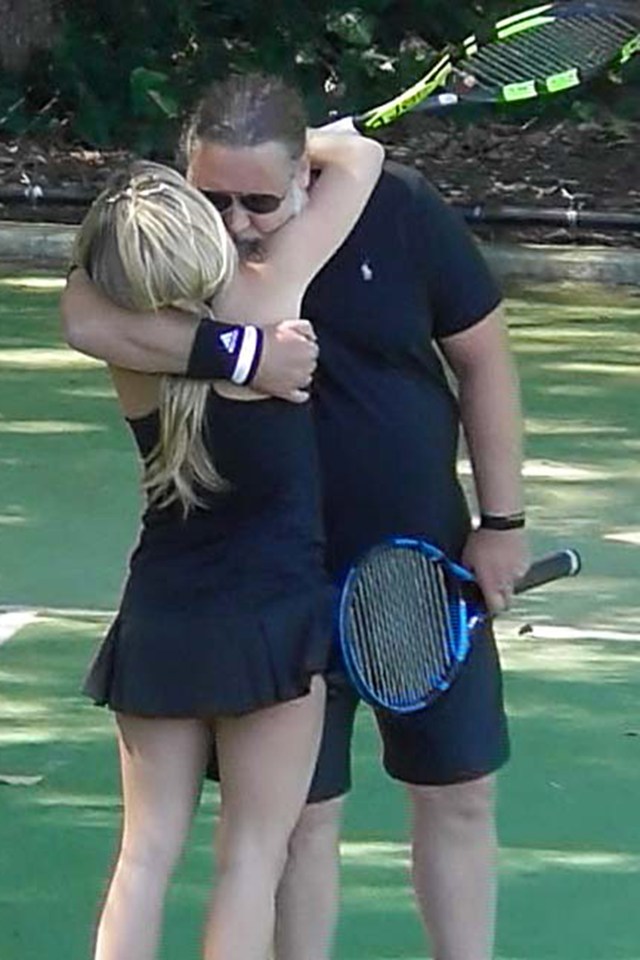 Russell and Britney piled on the PDA during a tennis session in Sydney