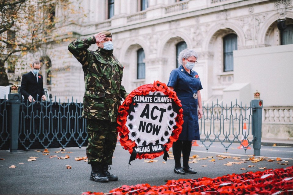 British Army veteran and Extinction Rebellion member, Donald Bell, laid a wreath with mum-of-two Anne White