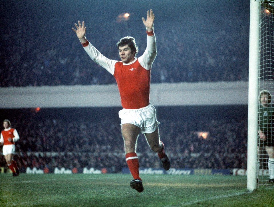 Malcolm Macdonald celebrates scoring for Arsenal against Newcastle