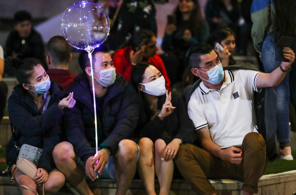 Some revellers opted to wear a mask while out celebrating 