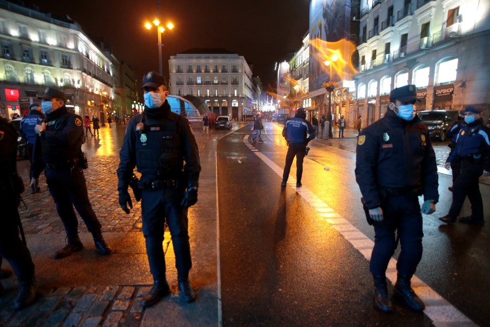 Police on the streets in Madrid enforcing Spain's strict lockdown