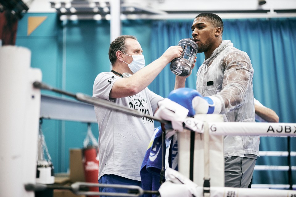 Anthony Joshua seeking advice from trainer Robert McCracken