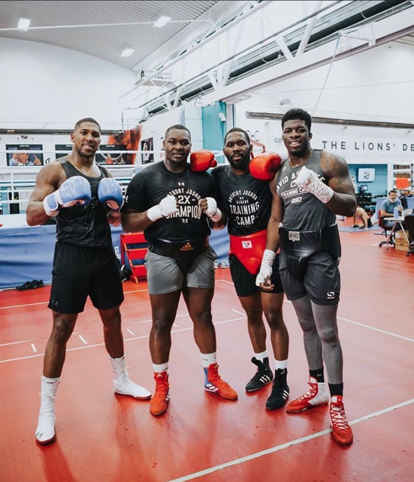 Bryant Jennings, second from the right, helped Joshua in sparring 