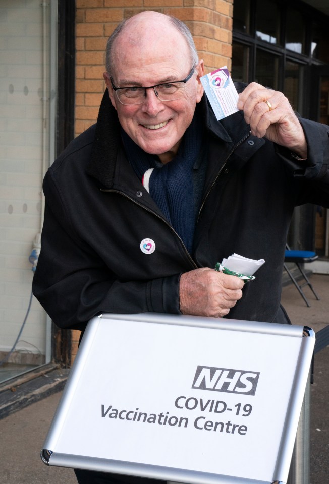 Arthur, 80, says the sticker he received with his jab 'meant as much as any medal'
