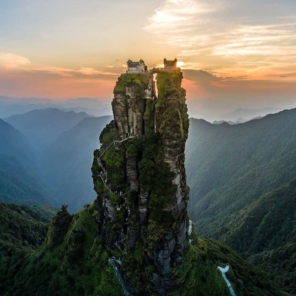 The two temples are perched atop the mountain in China