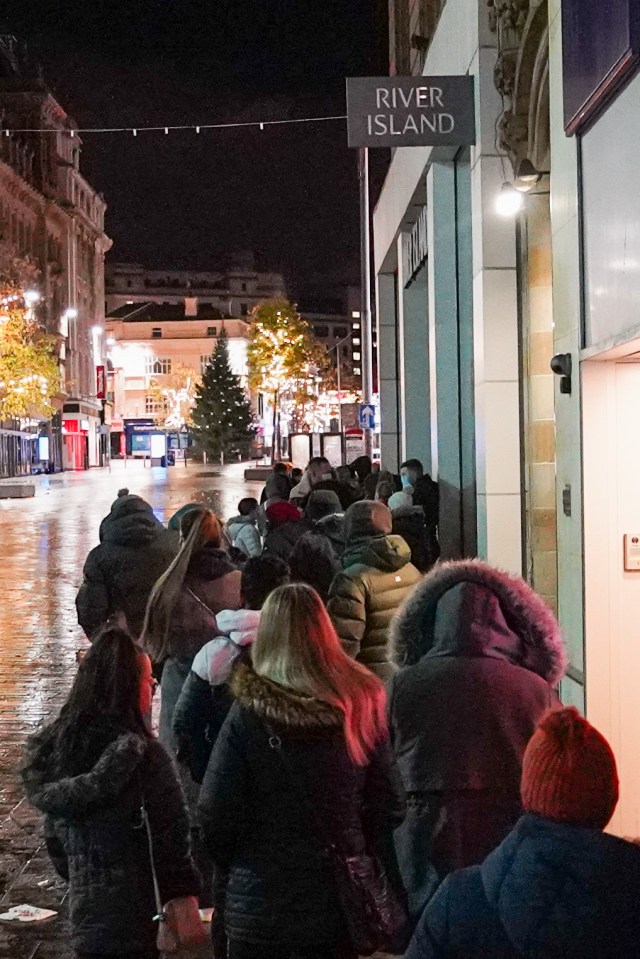Customers waited patiently outside shops in Liverpool ahead of big sales today