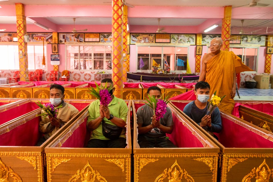 The ritual took part in the outer part of Bangkok, with worshippers looking to wash away any misfortune of the past year