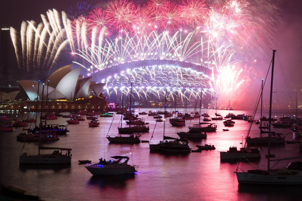 Fireworks erupt near the Sydney Opera House