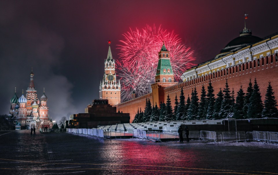 Red fireworks were set off over the Kremlin in Russia
