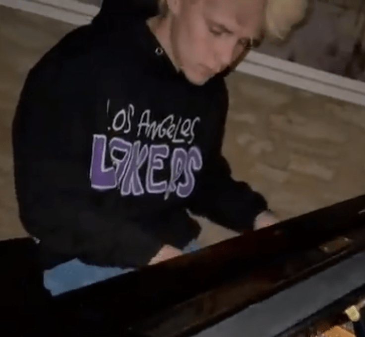 His dad David filmed him and joked 'Uncle Elton should watch out'