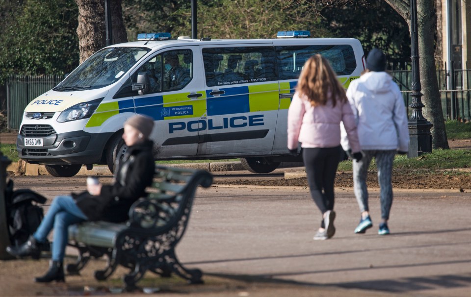 A police van in Hyde Park checks that Brits are following social distancing guidelines 