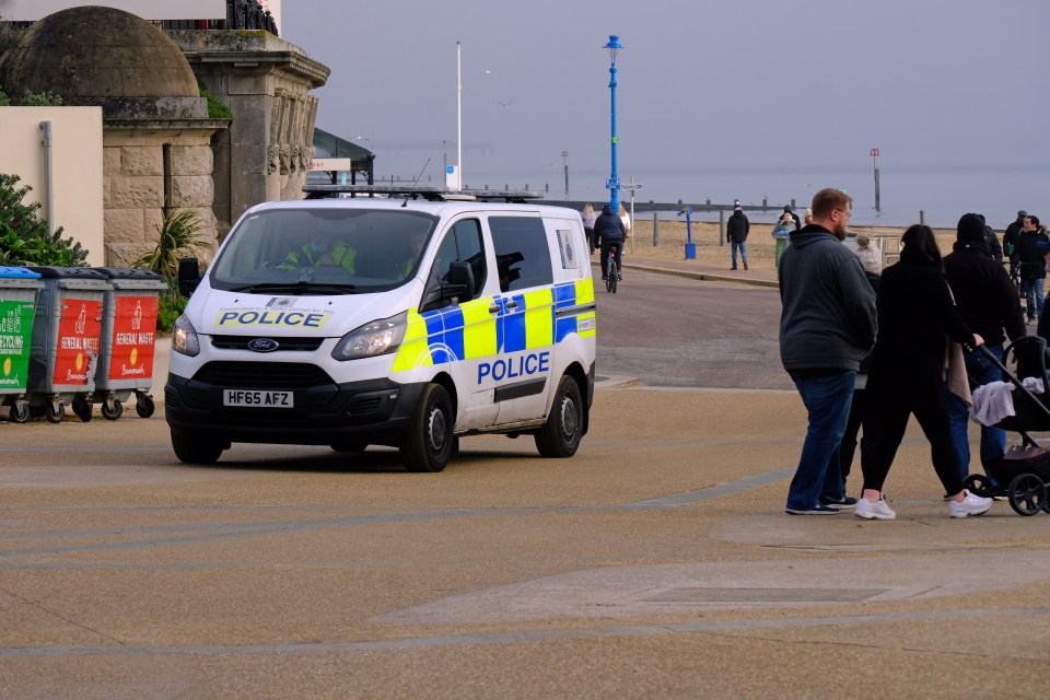 Police patrol the seafront at Bournemouth Beach in Dorset