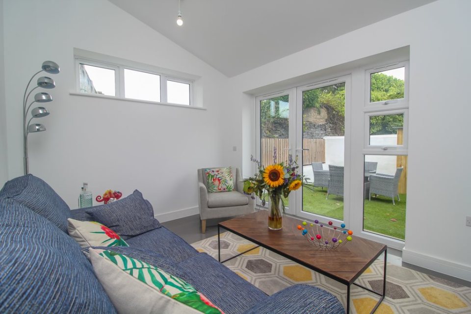 The open plan lounge and kitchen covers the back of the ground floor that measures 9.6ft wide by 23.6ft long