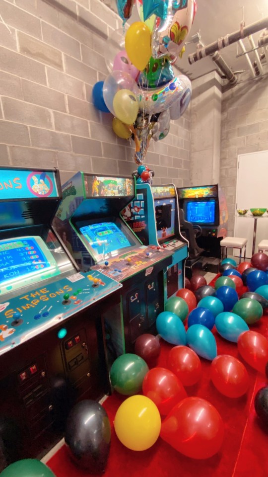 Gigi pulled out all the stops as she set up an arcade room with balloons covering the floor