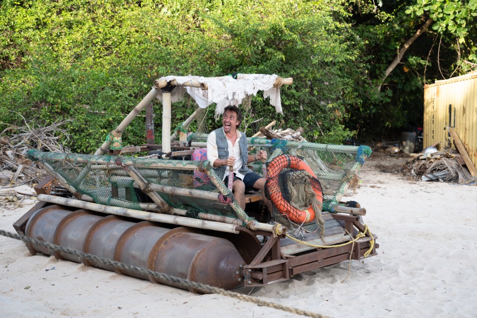 Richard at the helm of a makeshift boat