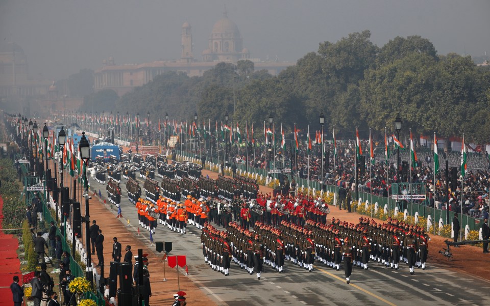 Indian army soldiers march through the ceremonial Rajpath boulevard during India's Republic Day celebrations in New Delhi