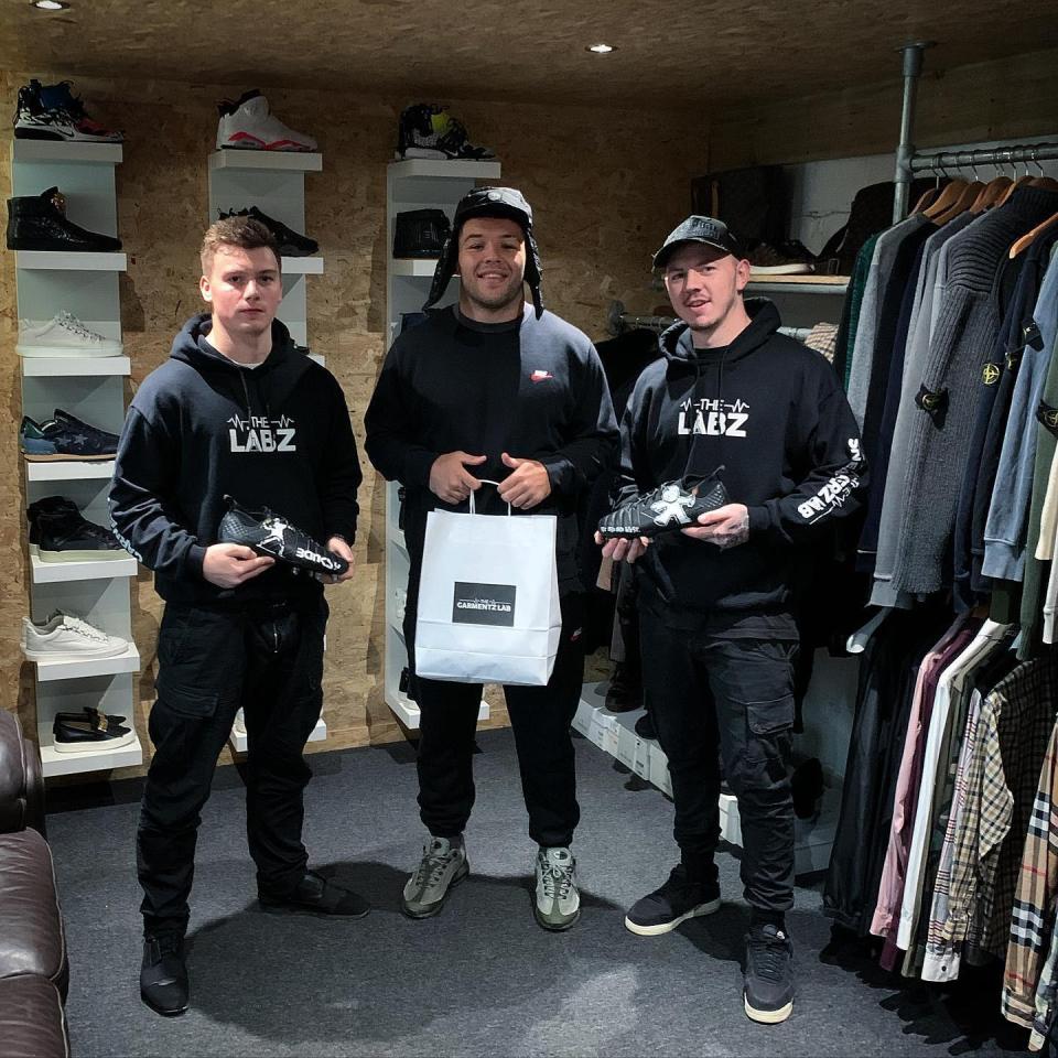 Genge picks up his Banksy boots from the team at the Sneakerz Lab