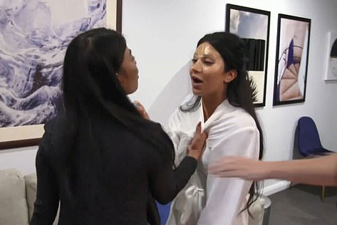 She pulled Martha in by her bath robe in the fight