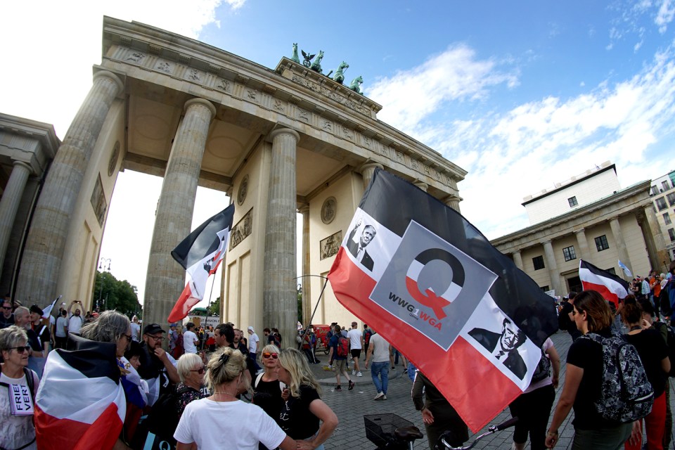 Protests in Germany throughout the summer saw a large number of Q supporters