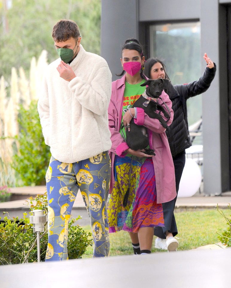 The singer looked casual in a baggy shirt while Anwar opted for patterned trousers