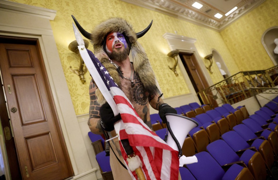 Jake Angeli has become the face of QAnon for his role in the Capitol riot on January 6