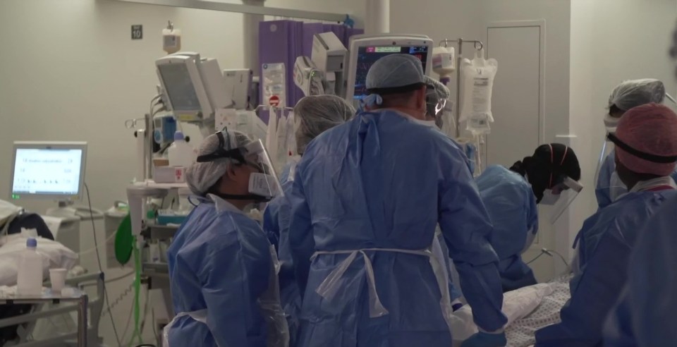 Staff treat a Covid patient inside University College Hospital in London