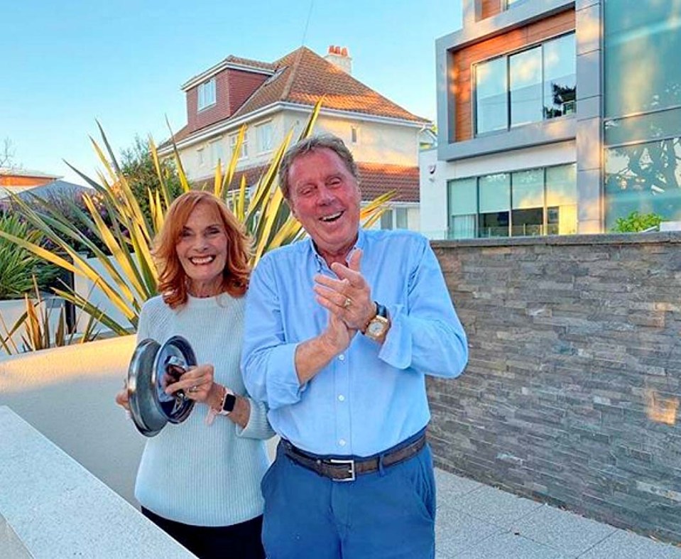 Harry Redknapp and wife Sandra Harris applauding key workers