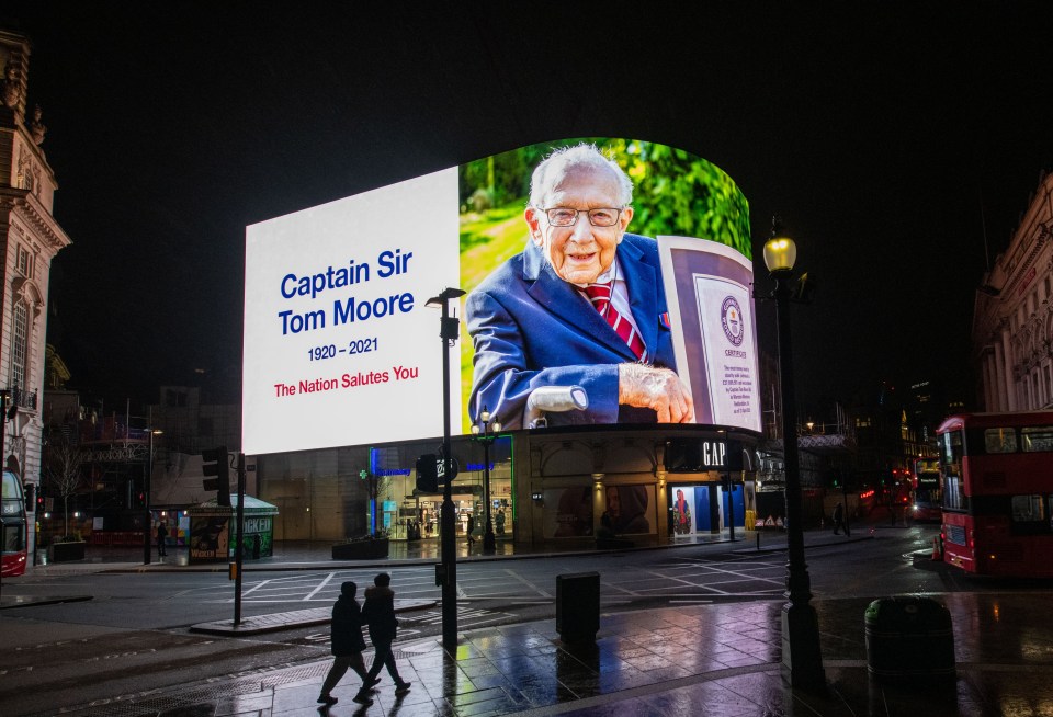 A tribute to Captain Sir Tom Moore is displayed at Piccadilly Circus shortly after it was announced that he has died 
