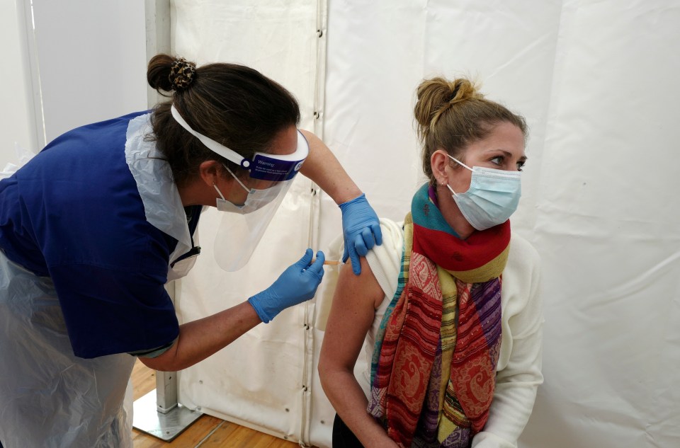 Care Home Worker Marie Annn Gynn receiving the AstraZeneca/Oxford Covid-19 vaccination 