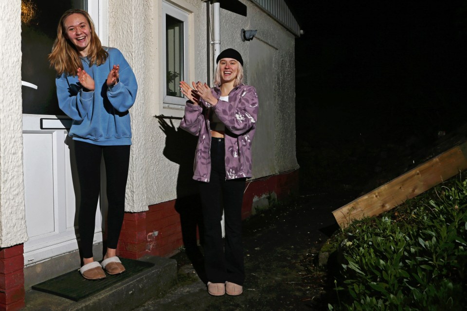 Falmouth University students take part in a doorstep clap for Captain Sir Tom
