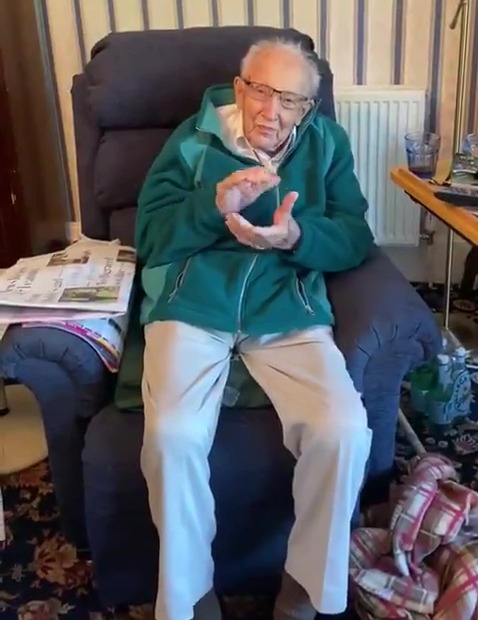 Captain Tom claps for carers in July last year