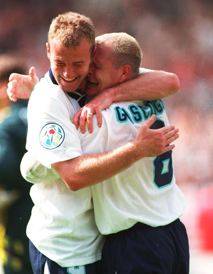 Alan Shearer and Paul Gascoigne hug after a goal against Scotland