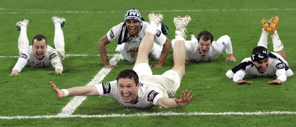 The Spurs players celebrate their 2-1 win over London rivals Chelsea at Wembley