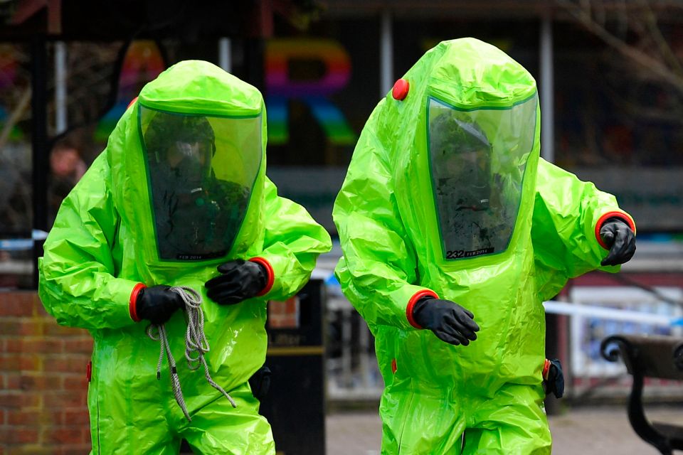 Members of the emergency services in hazmat suits in the wake of the Salisbury attack