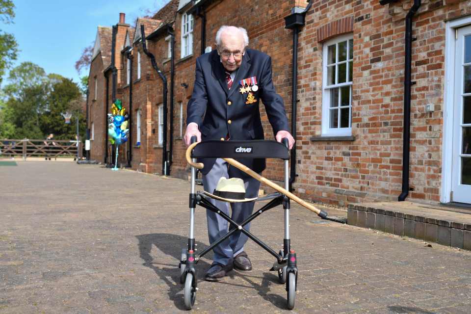 Captian Tom Moore doing a lap of his garden in the village of Marston Moretaine